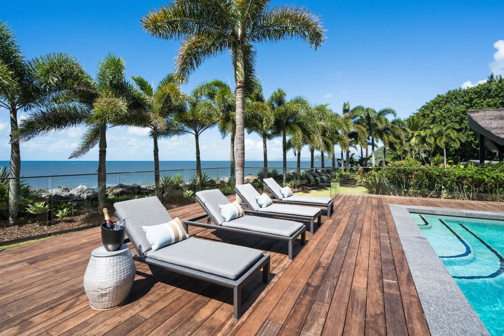 Pool benches with a champagne bucket on the side