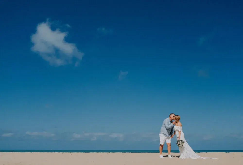 A couple wearing simple and casual clothes for their wedding day
