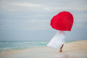 bride with red heart umbrella