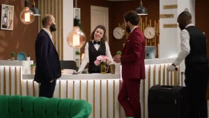 Future groom talks to the venue staff during an ocular visit