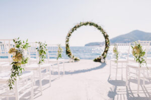 wedding ceremony setup with waterfront view