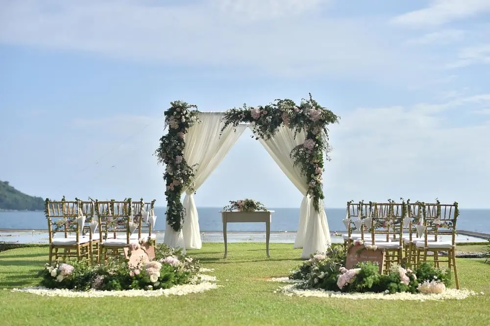 outdoor garden waterfront wedding setup