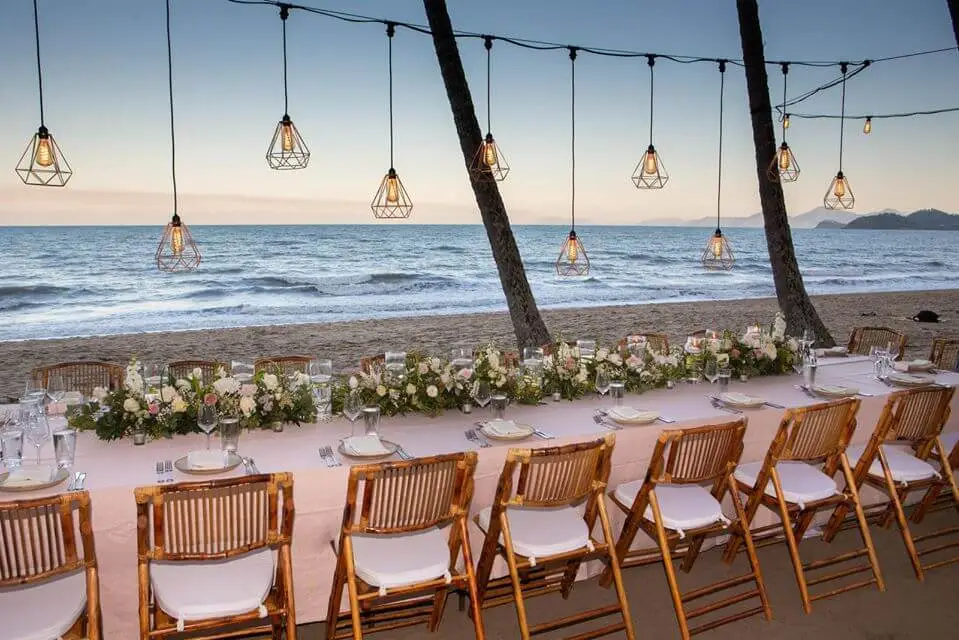 wedding reception with arranged tables in an outdoor setting
